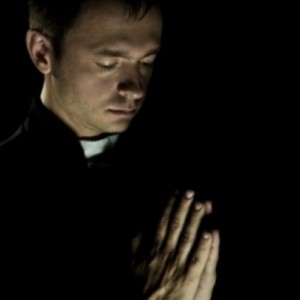 Praying Priest