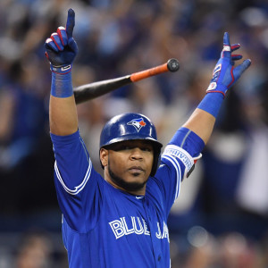 Toronto Blue Jays' Edwin Encarnacion celebrates after hitting a walk-off three-run home run against the Baltimore Orioles during the 11th inning of an American League wild-card baseball game in Toronto, Tuesday, Oct. 4, 2016. (Frank Gunn/The Canadian Press via AP)